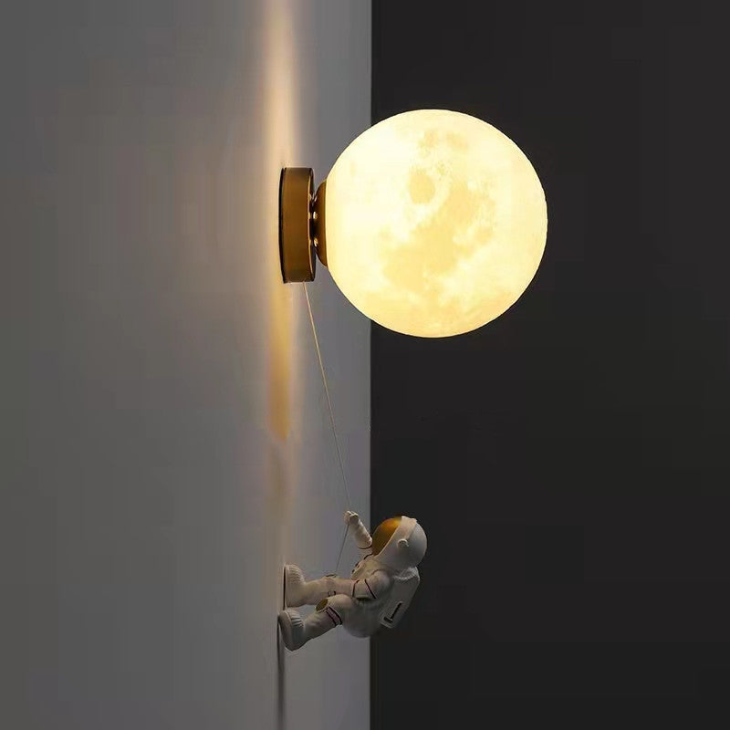 Applique murale astronaute suspendu