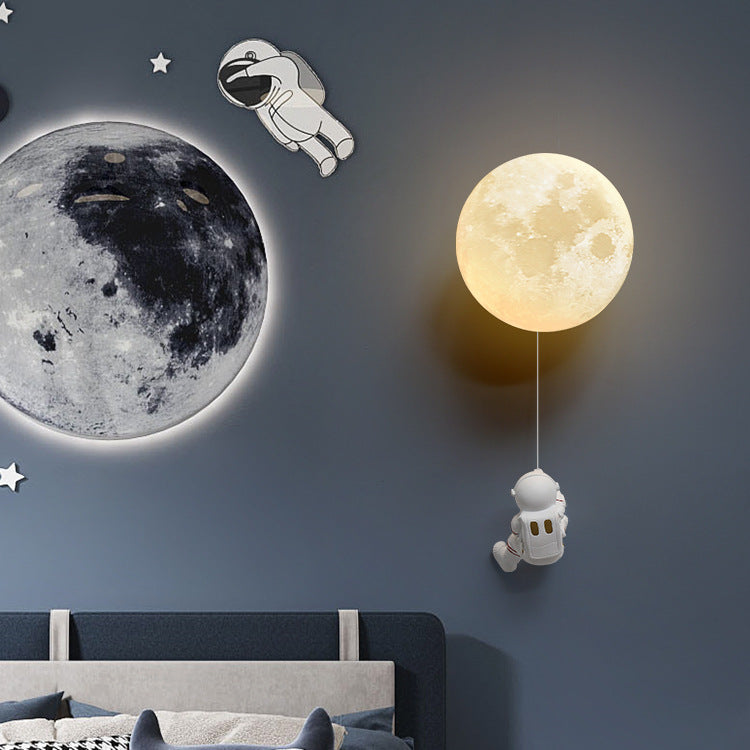 Applique murale astronaute suspendu