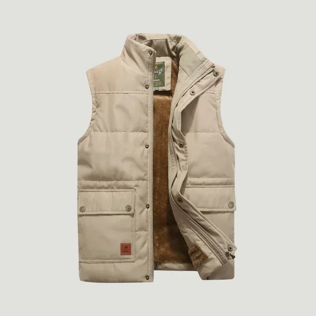 "Gilet sans manches homme élégant, bleu, design épuré et polyvalent, poches pratiques, idéal demi-saison"