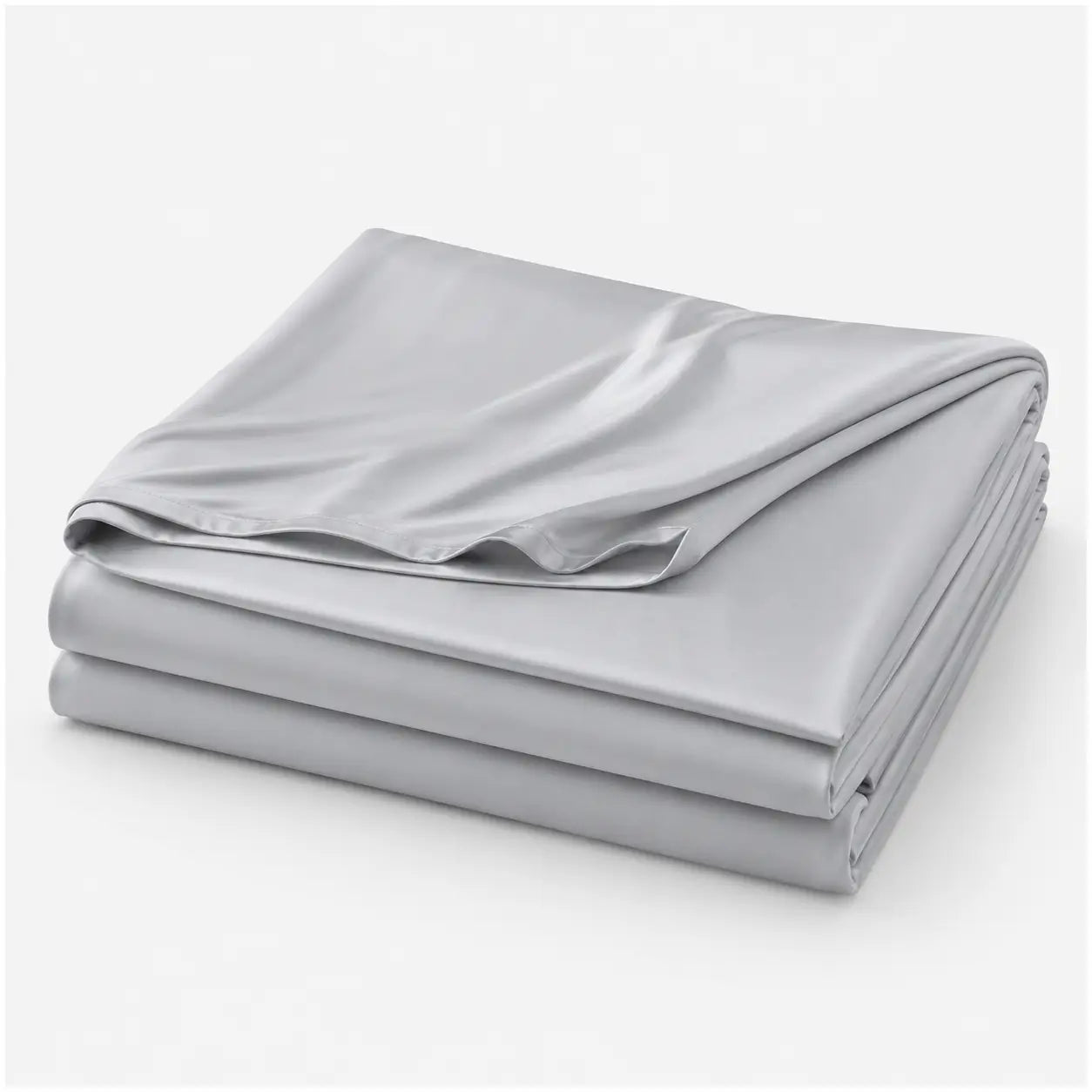 Couverture rafraîchissante Marea gris perle, légère et respirante, en tissu effet soie glacée, présentée pliée sur fond blanc.